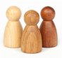 Grapat 3 Natural Wooden Nins Peg Doll Set, made from beech, oak and sapeli wood with a natural oiled finish. Simple and tactile peg dolls for Waldorf story telling and small world play. White background. 