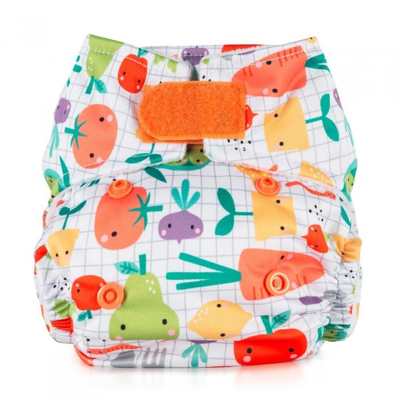 Baba + Boo eco-friendly reusable Newborn Nappy in Grow Your Own Print, with prints of radishes, carrots, pears, lemons with eyes and blushing cheecks on a white nappy with a grey tiles effect, an orange closure tab, taken on a white background