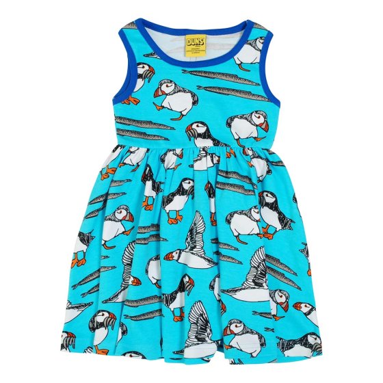 DUNS Sweden childrens organic cotton sleeveless gather skirt dress in the atoll blue puffin print on a white background