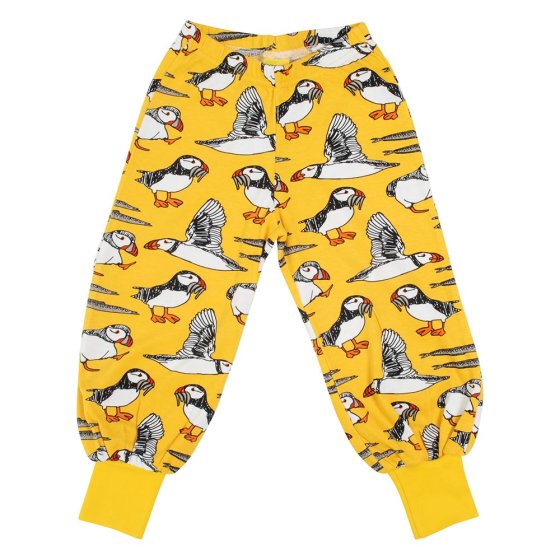 DUNS Sweden childrens organic cotton baggy pants in the lemon chrome puffin print on a white background