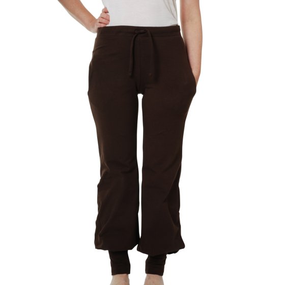Woman wearing the DUNS More than a fling eco-friendly adults java brown baggy pants on a white background