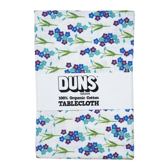 DUNS Sweden organic cotton tablecloth in the forget me not print on a white background