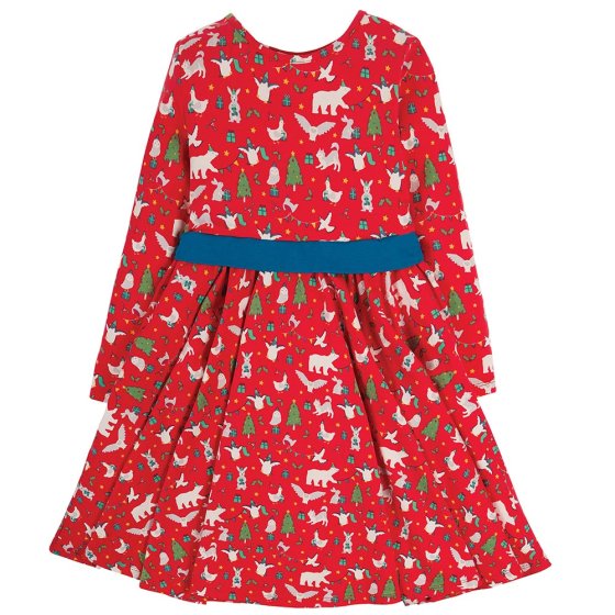 Frugi red let's party long sleeve skater dress with blue waist band and Christmas theme party print with bears, rabbits holding gifts, penguins in arty hats and Christmas Trees on white background