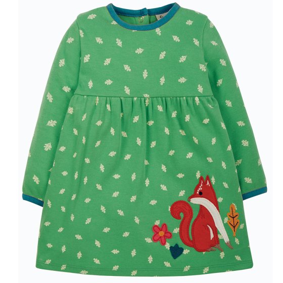 Frugi long sleeved green leaf printed childrens dress with blue collar and a fox and floral applique on the dress' bottom left corner on a white background