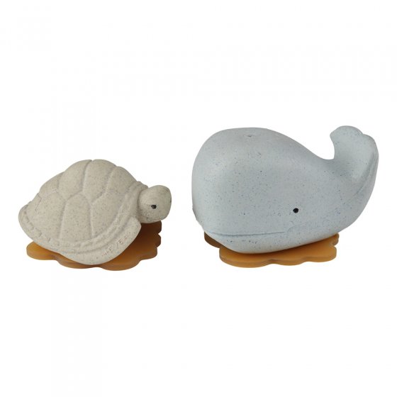 Hvea upcycled natural rubber turtle and whale bath toys on a white background