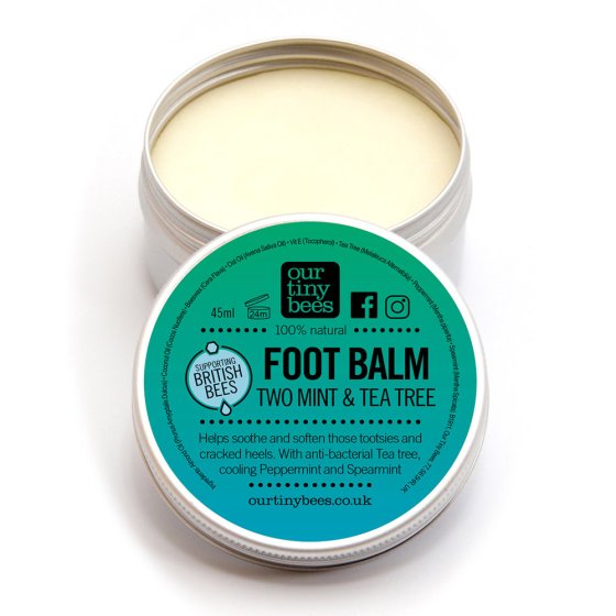 Our Tiny Bees Beeswax Minty Foot Balm in tin on white background