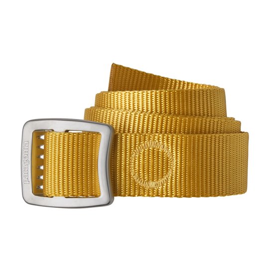 Patagonia adults adjustable tech web belt in surfboard yellow rolled up on a white background