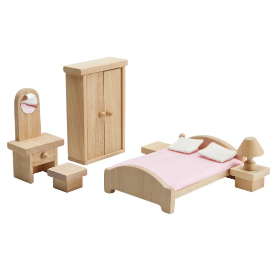 Plan toys eco-friendly wooden classic bedroom dolls house set on a white background