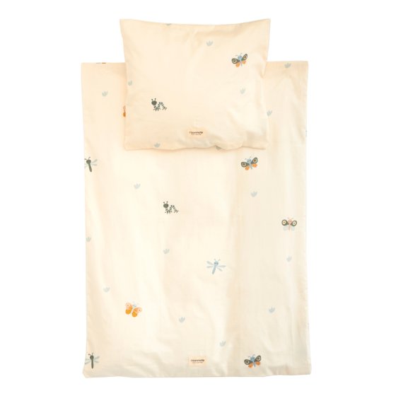 Roommate organic cotton single baby bugs cream bedding set laid out on a white background