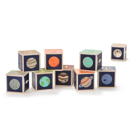 Uncle Goose plastic free wooden planet blocks set stacked in a pile on a white background