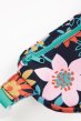 Frugi Dahlia Fields Bertie Belt Bag Bum Bag, close up of colourful floral print and aqua zip. White background.