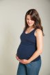 Frugi indigo saffron maternity and nursing vest worn by a pregnant woman 