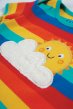 Close up of applique sun and cloud on Frugi Bobster