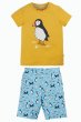 organic cotton PJs with a central puffin character printed on the sunny yellow short-sleeve top with glow-in-the-dark details and coordinating organic cotton jersey pyjama shorts in blue with a fun seabird print from frugi