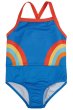 blue swimsuit for children with a retro rainbow design stretching around the sides, a contrasting red trim and cross-over straps from frugi