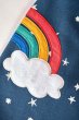 Close up of the rainbow cloud on the kids Frugi organic cotton pippa pinafore 