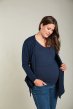 Frugi saffron indigo vest worn by a pregnant woman with jeans and cardigan