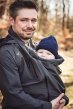 Mamalila Shelter Men's Babywearing Rain Jacket in Anthracite. Lifestyle side view of this men's technical babywearing rain coat with the baby carrier insert. Woodlandbackground 