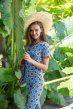 a woman wearing blue organic cotton short sleeve top and leggings with watermelon print from maxomorra