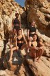 Women stood and sat on some rocks wearing the WUKA reusable high waisted period underwear