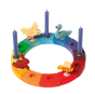 Grimm's 12-Piece Rainbow Birthday Celebration Ring with blue candles and decorative figures