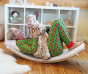 Adult playing with child wearing the Maxomorra Holly Long Sleeve adult pyjamas, with playroom shelves and toys in the back ground