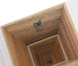 Inside of Naef Diamond stacking shape toy, showing the Naef logo printed on the wood.