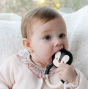 Baby chewing the Lanco Nui the Penguin Teether