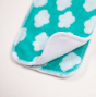 Tots Bots newborn nappy pad shown in fluffy clouds print