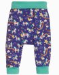 purple parsnip pants for babies and toddlers with a magical star, rainbow and unicorn print and a contrasting aqua stretchy fold-down waistband and turn-up ankle cuffs from frugi