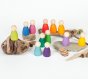 Grapat 12 Nins Wooden Peg Dolls in the colours of the rainbow with wood and stone natural resources. A classic Waldorf peg doll toy for open ended play. White background.