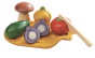 The PlanToys Assorted Vegetable set is a play food set for toddlers and includes a mushroom, courgette, red onion, yellow pepper and red tomato, wooden knife and chopping board. White background.
