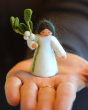 Close up of an Ambrosius Winter Mistletoe collectable figure in the palm of a hand