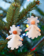 2 Ambrosius plastic-free snow crystal Christmas decorations hanging from a Christmas tree