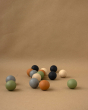 Babai eco-friendly wooden petanque game on a brown background