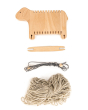 Pieces of the Bajo sustainable wooden weaving sheep set laid out on a white background
