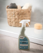 Bio-D natural eco friendly streak free glass and mirror cleaner in a 500ml spray bottle, in front of a shower