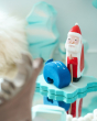 Close up of a Bumbu Santa Claus toy stood on a Bumbu ice floe block