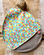 Close up of the Close breast feeding maternity pads pouch hanging on a wooden background