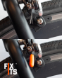 Close up of a bike brake cable sealed with a FixIts reusable plastic DIY fixing strip
