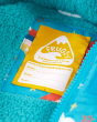 Close up of the name label in the Frugi blue rainbow snow jacket
