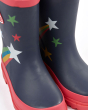 Close up of the Frugi kids star print wellington boots on a white background