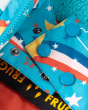 Close up of the popper closures on the Frugi eco-friendly rainbow print blue winter jacket
