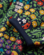 Close up of the cuffs on the Frugi childrens floral print dani dress