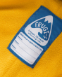 Close up of the Frugi name tag on the blue puffin print waterproof toddler suit