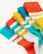 A closer view of the colours on the Frugi Reed Rib Socks 5-Pack - Rainbow, made from GOTS Organic Cotton. A five pair pack of ribbed socks featuring striped designs, on a cream background.