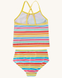 The back view of the Frugi Kiri Tankini - Sunshine. A beautiful and clolourful sunshine striped print tankini, bottoms and top set with yellow cross over shoulder straps and soft lining. Made with Recycled material, on a cream background