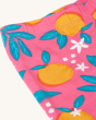 A closer view of the waistband, stitching, material and orange blossom print on the Frugi Organic Cotton Laurie Shorts Orange Blossom/Tangerine - 2 Pack