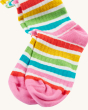 A closer look at the rainbow stripes, heel and toe section of the Frugi Organic Hygge Knee High Socks - Rainbow. Colourful rainbow striped knee high long socks, with white, pink, red, yellow, green and blue rainbow stripes, on a cream background
