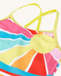 A close up view of the sun and yellow cross over shoulder straps on the Frugi Kiri Tankini - Sunshine. A beautiful and clolourful sunshine striped print tankini, bottoms and top set with cross over back and soft lining. Made with Recycled material, on a c